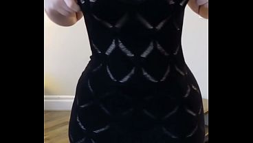 natural thick woman wearing a see through dress with nothing under