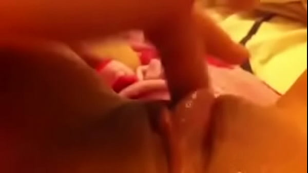 Fingering her very wet pussy