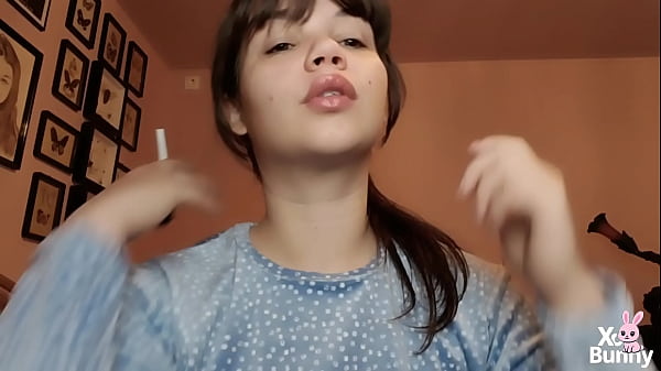 Big lips covered in lipgloss smoking with close up of the lips