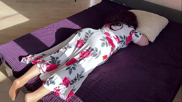The stepmom lay down on the bed but the stepson disturbed her
