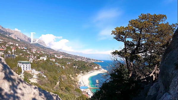 Download Video - Public erotica&comma; a girl with a stunning figure shows her magnificent ass against the backdrop of the sea and mountains&period; DickForStepSister