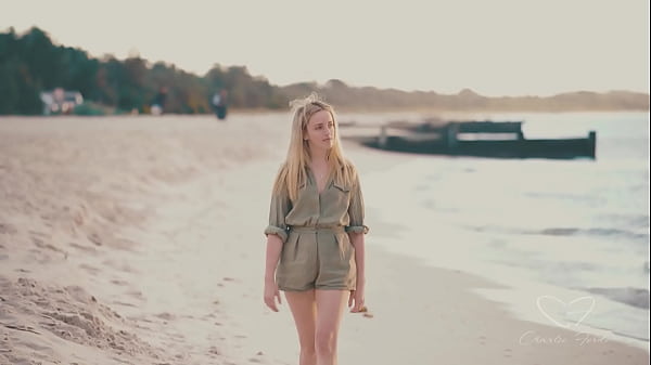 Tattooed brunette girl sharing some sex toys with her friend