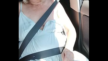 Naughty girl playing in the car
