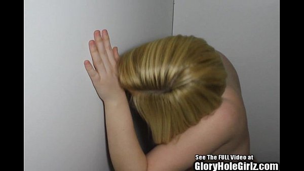 Perky blonde Carol getting a face full of cum in the glory hole