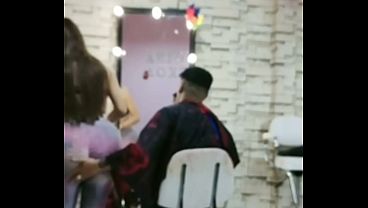 I visited this girl at her barbershop and she greeted me wearing tight clothes that accentuated her body, making me want to get frisky with her and kiss her until I was filled with sexual lust.